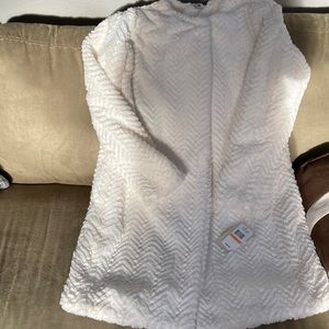 Ivory over coat snap button at neckline